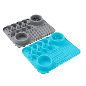 Gray and blue silicone ice cube trays on a white background at Pet Servo