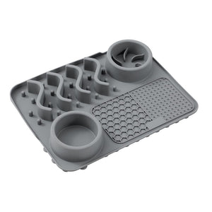 Gray silicone ice cube tray with textured surface on a white background at Pet Servo