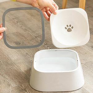 Pet food bowl with a paw print design on a wooden surface at Pet Servo
