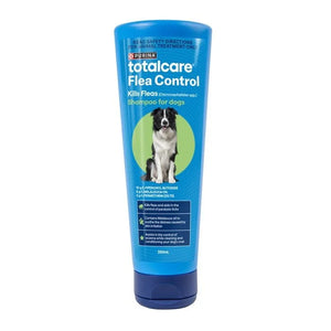 Blue bottle of totalcare Flea Control shampoo for dogs on a white background at Pet Servo