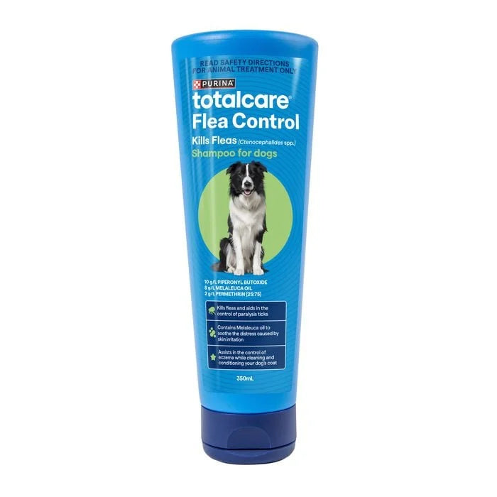 Blue bottle of totalcare Flea Control shampoo for dogs on a white background at Pet Servo