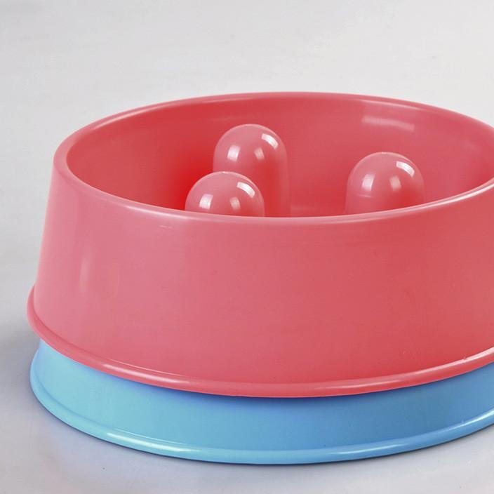 Pink and blue pet toy with three spherical balls inside on a light gray background at Pet Servo