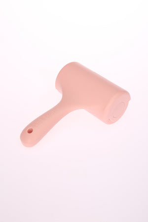 Pink rubber stamp on a white background at Pet Servo