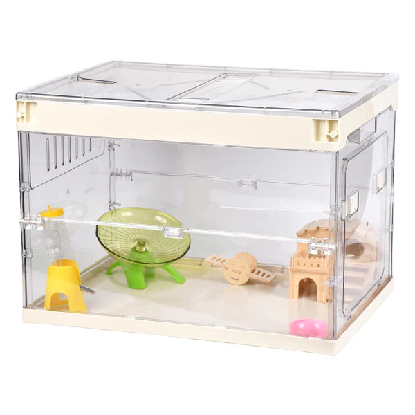 Clear hamster cage with various accessories on a white background