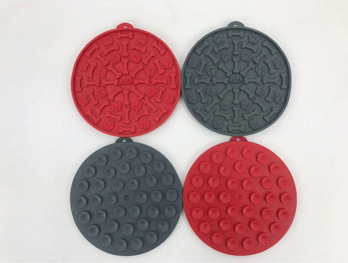 Four round silicone mats in red and gray on a white background at Pet Servo