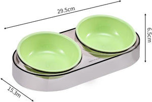 A double pet bowl set with two light green bowls on a rectangular stainless-steel base, shown with dimension lines and measurements: 29.5 cm length, 15 at Pet Servo
