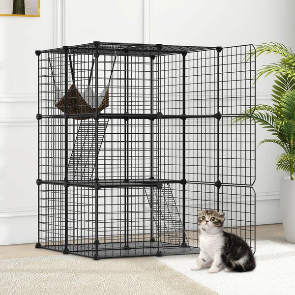 Black metal pet cage with a cat inside in a home setting