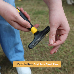 Person holding a grooming tool with 'Double Row Stainless Steel Pins' text on grass background