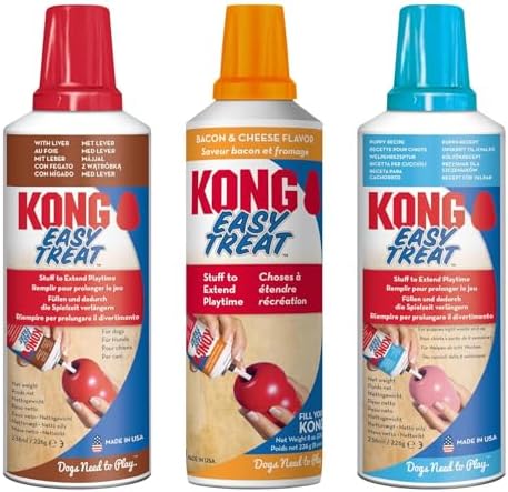 Three cans of KONG Easy Treat dog play extension spray shown side by side on a white background, with red, orange, and blue caps and labels for Bacon & Cheese Flavour and Plain Flavour at Pet Servo
