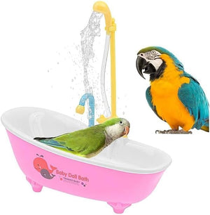 Two parrots in a pink bathtub with water being sprayed from a yellow shower head at Pet Servo