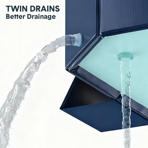 Close-up of a modern dark blue solar panel or wall unit with two water outlets, one showing a clear water stream and the other with a translucent cap, on a white background with the text 'TWIN DRAINS Better Drainage'.