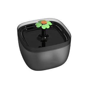 Black pet water bowl with a flower-shaped water spout on a white background at Pet Servo