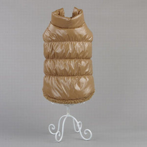 Beige puffer vest on a white stand against a gray background at Pet Servo