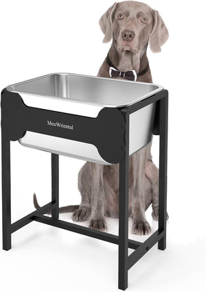 Dog standing next to a metal dog bowl on a stand with 'MeowWorld' branding at Pet Servo