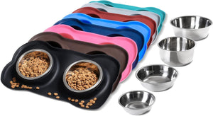 A set of pet feeding accessories on a white background, featuring a black dual-bowl pet mat filled with kibble, several stacked color-changing silicone mats in blue, pink, brown, red, gray, and teal, and five stainless steel bowls at Pet Servo