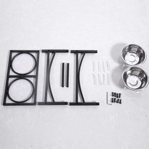 Black metal pet feeder stand kit with two bowls, mounting brackets, and small hardware pieces on a light gray background at Pet Servo