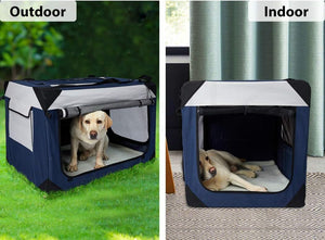 A split-screen comparison showing a navy and white portable dog crate in two settings: outdoors on grass with a dog sitting inside, and indoors on a patterned rug with a dog lying down. The top-left corner is labeled 'Outdoor' and the top-right corner is labeled 'Indoor' at Pet Servo