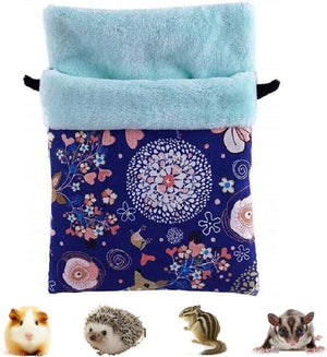 Floral-patterned pouch with blue top and small animals at the bottom at Pet Servo