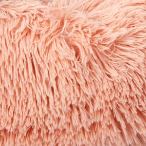 Close-up of a pink fluffy fabric texture at Pet Servo