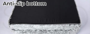 Close-up of a textured fabric with 'Anti-slip bottom' text on a light gray background at Pet Servo