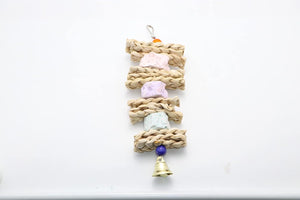 Cat toy with woven material and colorful beads on a white background at Pet Servo