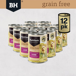 Multiple cans of BlackHawk grain-free dog food on a light background