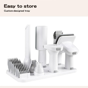 White kitchen organizer with various utensils on a light beige background at Pet Servo