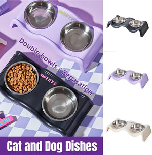 A collage showing pet double bowls: a large close-up of a lavender pet feeder/drinker base with two stainless steel bowls, a black version with a bowl of kibble, and three smaller color variants on the right. Text reads 'Double bowls / Separation' and 'Cat and Dog Dishes at Pet Servo