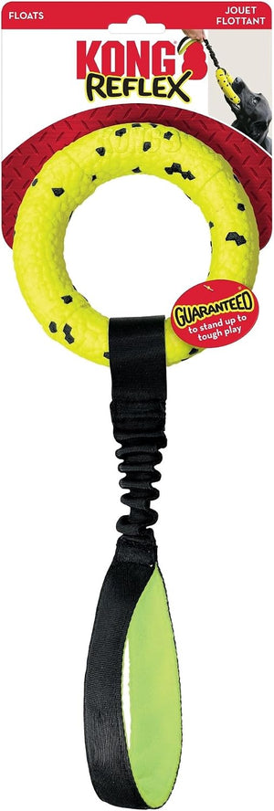 Kong Reflex Joust Floats dog toy in its original retail packaging. The toy features a bright yellow ring with black spots, a black elastic band, and a black and lime green handle at Pet Servo