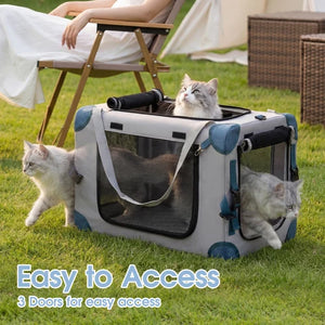 Pet carrier with cats inside on a grassy outdoor setting at Pet Servo