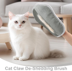 White cat sitting next to a grooming brush with text 'Cat Claw De-Shedding Brush' at Pet Servo