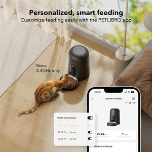 Smart pet feeder with a cat using it, and a smartphone displaying the PETLIBRO app interface.