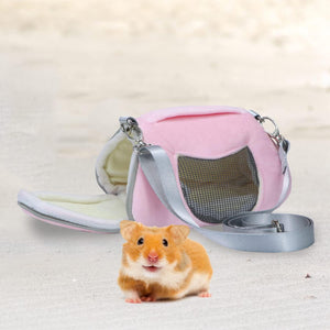 Pink pet carrier with a small animal on a light background at Pet Servo