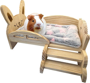 Guinea pig on a wooden pet bed with rabbit design and soft cushion at Pet Servo