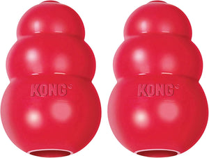Two red KONG dog toys on a white background at Pet Servo