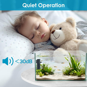 Child sleeping with a teddy bear next to a fish tank, emphasizing quiet operation at Pet Servo