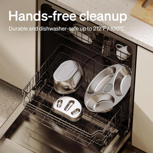 Dishwasher with stainless steel pots and pans inside, labeled 'Hands-free cleanup'.
