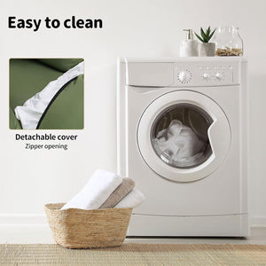 White washing machine with a detachable cover and zipper opening feature, next to a basket of clean clothes at Pet Servo