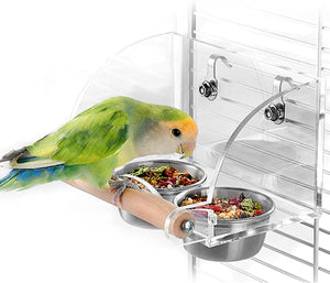 Bird perched on a transparent birdcage with food bowls attached at Pet Servo