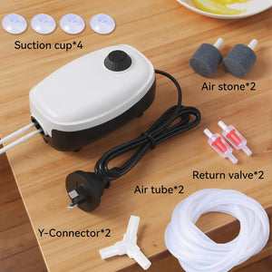 Aquarium air pump with accessories on a wooden surface at Pet Servo