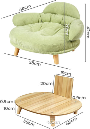 Green cushioned chair with wooden table and dimensions labeled at Pet Servo