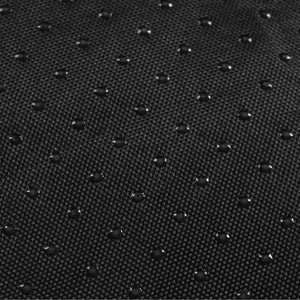 Close-up of a textured black fabric surface at Pet Servo