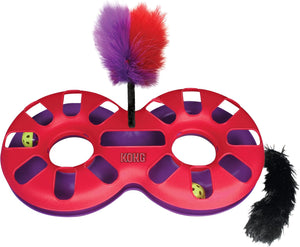 Kong cat toy featuring a red and purple plastic wheel with two feather wands (one purple/red, one black) and two small yellow balls inside the wheel slots, on a white background at Pet Servo