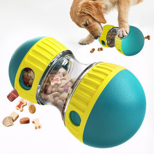 Pet toy with a transparent section filled with treats, accompanied by a puppy interacting with it at Pet Servo
