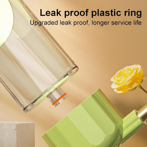 Green glass bottle with leak proof plastic ring feature and yellow rose on beige background at Pet Servo