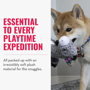 Dog holding a plush toy with text about playtime and soft material at Pet Servo