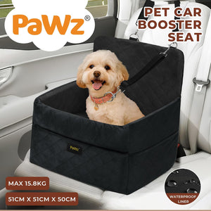 Pet car booster seat with a dog inside, branded as PaWz, in a car interior at Pet Servo