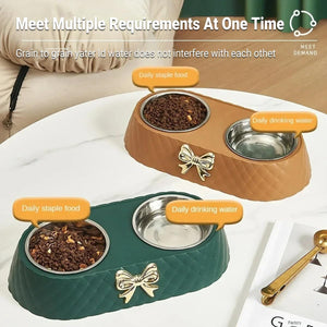 Pet feeding station with two bowls, one green and one brown, on a white surface at Pet Servo
