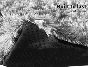 Close-up of a pet bed with non-slip waterproof underside and fluffy texture at Pet Servo