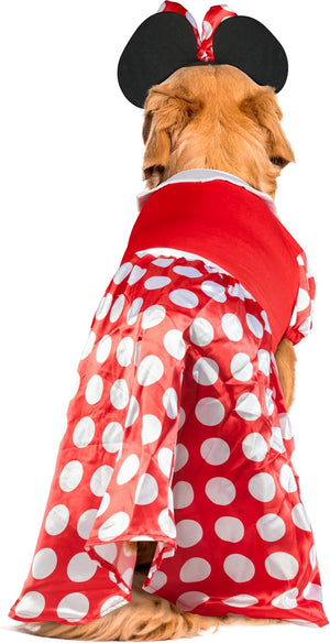 A golden retriever dog viewed from behind wearing a red and white polka dot costume dress with black and red Minnie Mouse-style ears on a white background at Pet Servo
